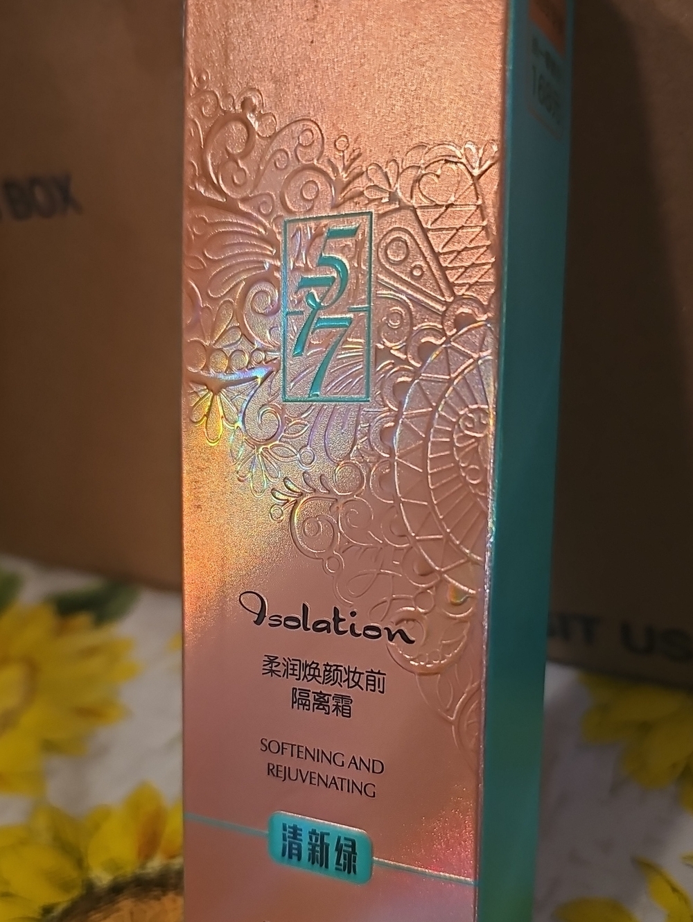 Isola Moisturizer in Rose Gold and Teal Packaging